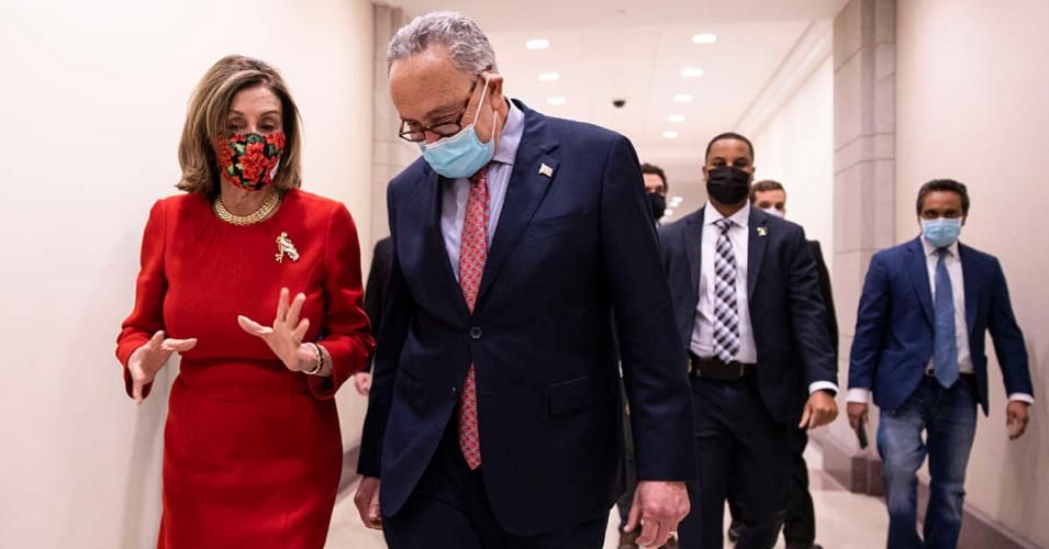 House Speaker Nancy Pelosi and Senate Majority Leader Chuck Schumer speak after a press conference on Capitol Hill in Washington, D.C.