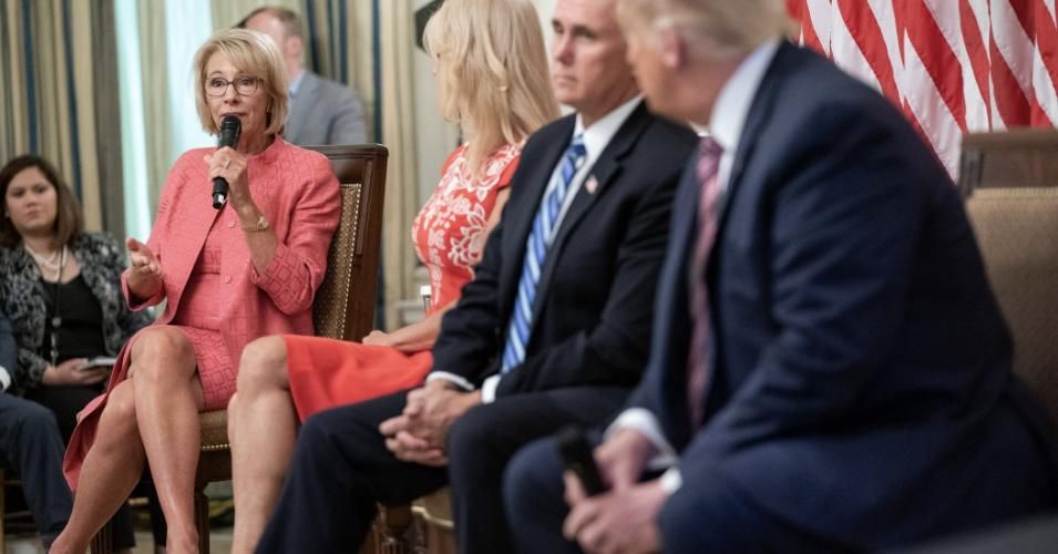 President Donald Trump and Secretary of Education Betsy DeVos attend a roundtable on reopening schools at the White House on August 12, 2020. (Photo: Shealah Craighead/Flickr)