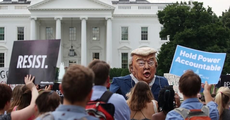 People protest against U.S. President Donald Trump in front of the White House on July 11, 2017 in Washington, D.C.