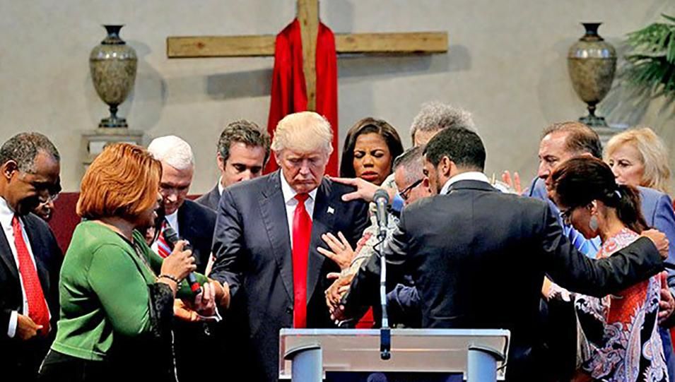 Early in the 2016 Presidential race, Trump was anointed by a bevy of Evangelicals in Cleveland, who prayed to protect him from a “concentrated satanic attack”.