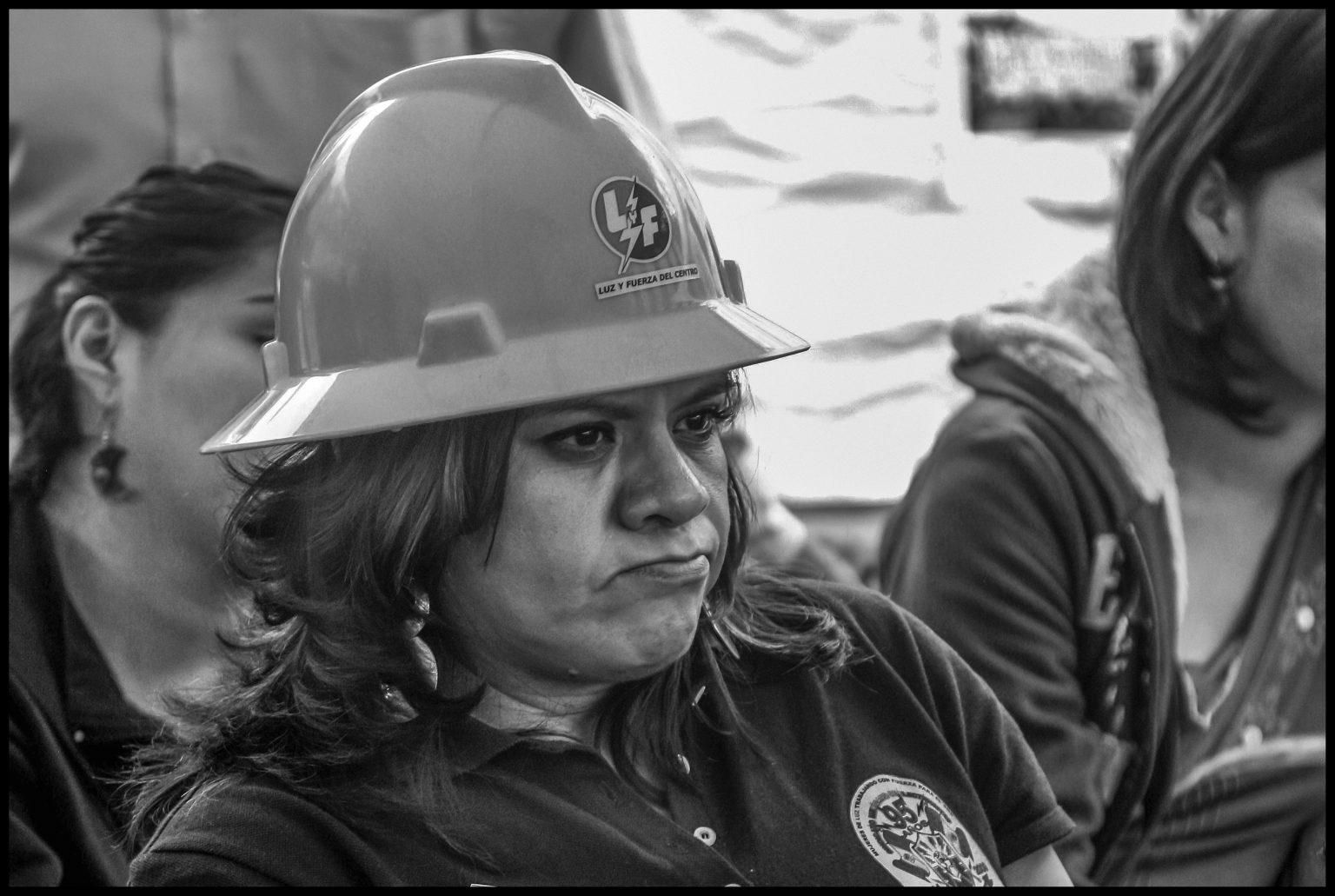 Elva Nora Cruz is the sister of a fired Sindicato Mexicano de Electricistas (SME) member, and sits with Triqui women protesting violence in Oaxaca under a tent in Mexico City’s central square, the zocalo (Photo: David Bacon)