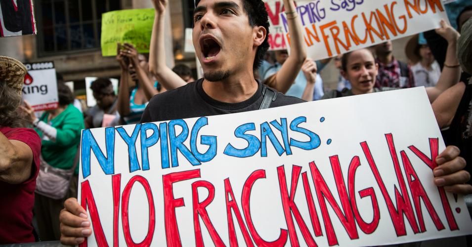 Protesters demand a statewide ban on hydraulic fracturing, a controversial technique for removing oil and natural gas from the earth also known as 'fracking,' on June 30, 2014 in New York City. The protest was held outside a Democratic party event with New York Governor Andrew Cuomo attending. (Photo by Andrew Burton/Getty Images)