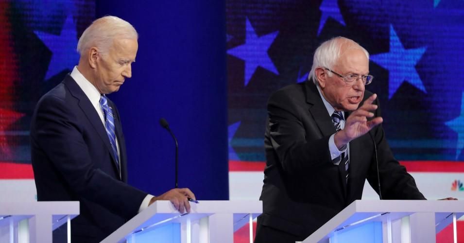 Former Vice President Joe Biden looks on as Sen. Bernie Sanders (I-Vt.) speaks during the second night of the first Democratic presidential debate on June 27, 2019 in Miami, Florida. (Photo: Drew Angerer/Getty Images)