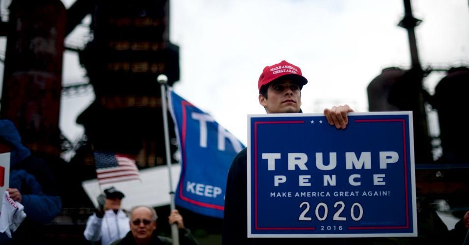 Ross Saveri, 22, clutches a "TRUMP PENCE 2020" placard, while joining fellow Donald Trump supporters demonstrating outside of a FOX News Town Hall with Democratic presidential candidate, U.S. Sen. Bernie Sanders (I-VT) at SteelStacks on April 15, 2019 in Bethlehem, Pennsylvania. Sanders is running for president in a crowded field of Democrat contenders. (Photo by Mark Makela/Getty Images)