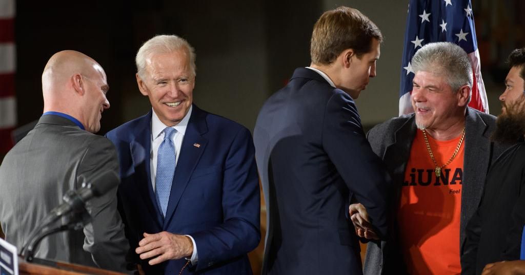 Joe Biden visited Pittsburgh in support of Democratic congressional candidate Conor Lamb (3rd L) Tuesday, March 6, 2018, at the Union Carpenters Training Center in Pittsburgh. (Photo: Jeff Swensen/Getty Images)