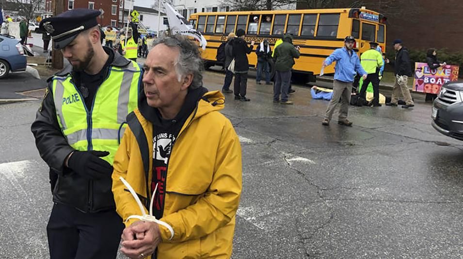 Police arrested 25 protesters who they say were blocking roads outside Bath Iron Works on Saturday morning, April 27, 2019 during the christening ceremony for the Zumwalt-class guided-missile destroyer USS Lyndon B. Johnson.
