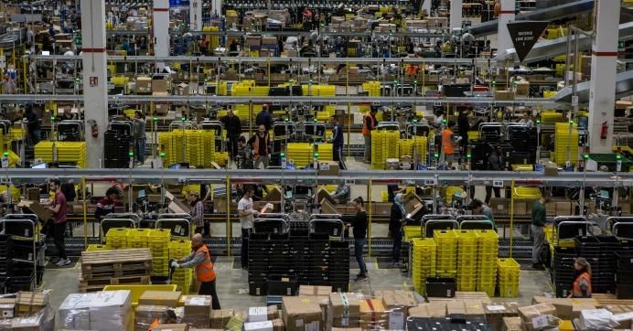 A general view of the inbound area of the Amazon.com MPX5 fulfillment center on November 17, 2017 in Castel San Giovanni, Italy. "In seeking to defend the living world from the maelstrom of destruction," writes Monbiot, "we might believe we are fighting corporations and governments and the general foolishness of humankind. But they are all proxies for the real issue: perpetual growth on a planet that is not growing." (Photo by Emanuele Cremaschi/Getty Images)