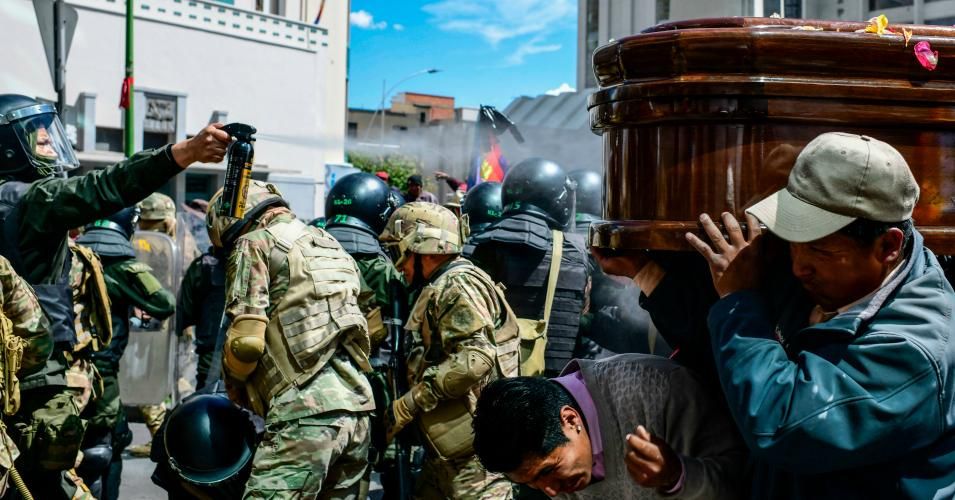 Bolivian riot police breaks up a massive funeral procession that turned into an anti-government demonstration in La Paz on November 21, 2019. (Photo: Ronaldo Schemidt/AFP/Getty Images) 