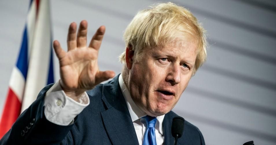 U.K. Prime Minister Boris Johnson will smear lipstick all over this pig of a deal and declare it a triumph. (Photo: Michael Kappeler/Picture Alliance via Getty Images)