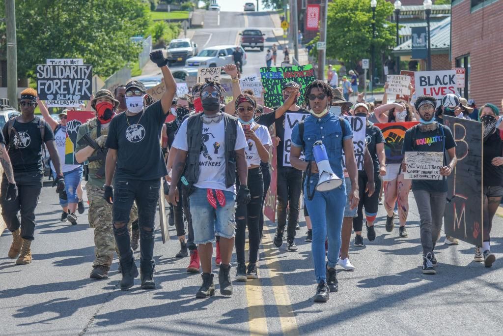 Travon Brown, with megaphone, leads the Black Lives Matter Protest march through Marion, Virginia on Friday, July 3, 2020. (Earl Neikirk for The Washington Post via Getty Images)