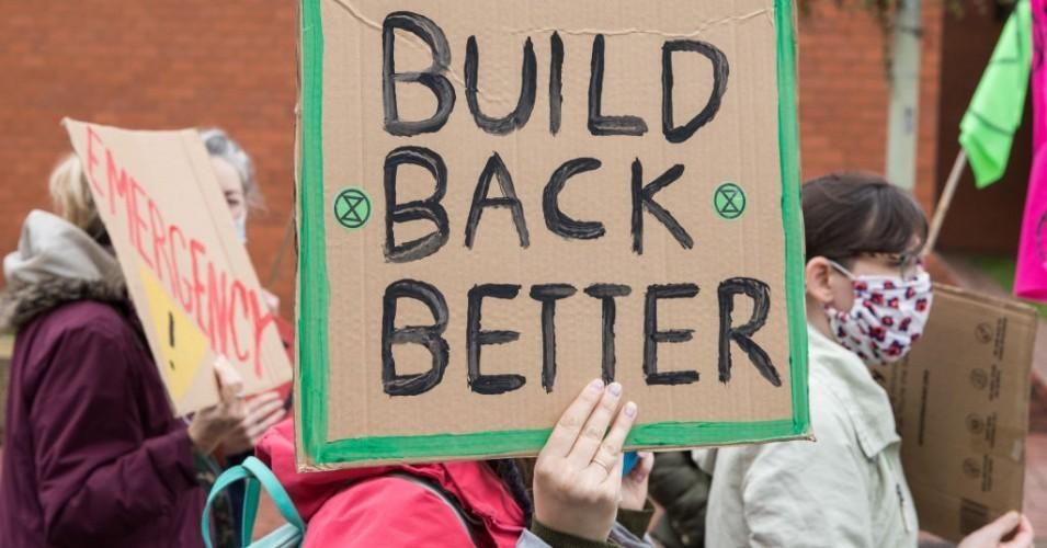 sign reads: Build back better