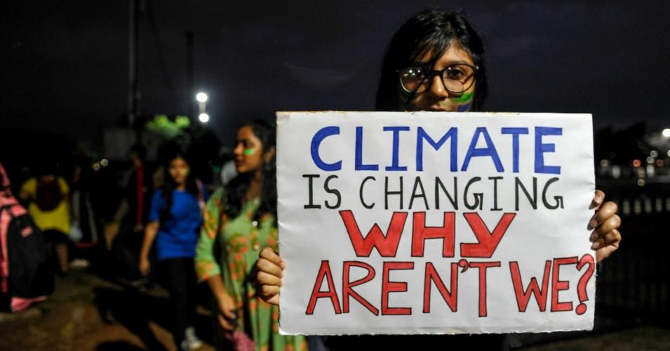 A youth holds a placard as she participates in a climate strike to protest against governmental inaction towards climate breakdown and environmental pollution, part of demonstrations being held worldwide in a movement dubbed "Fridays for Future" in Hyderabad on September 20, 2019. (Photo: Noah Seelam/AFP/Getty Images)