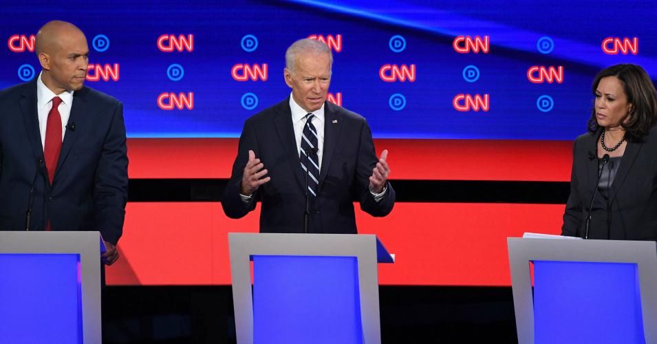Democratic presidential hopeful Former Vice President Joe Biden (C) gestures as he speaks flanked by US Senator from California Kamala Harris (R) and US Senator from New Jersey Cory Booker during the second round of the second Democratic primary debate of the 2020 presidential campaign season hosted by CNN at the Fox Theatre in Detroit, Michigan on July 31, 2019. (Photo: Jim Watson/AFP/Getty Images) 