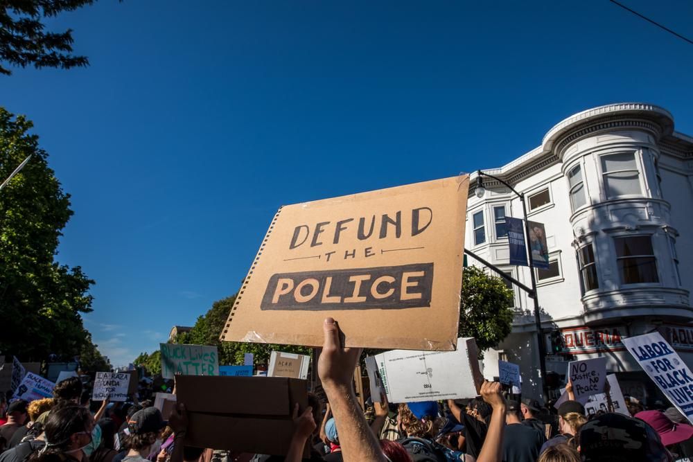 It’s time to divest resources from law enforcement, and put them into services that prioritize the community at large, like education. (Photo: Shutterstock)
