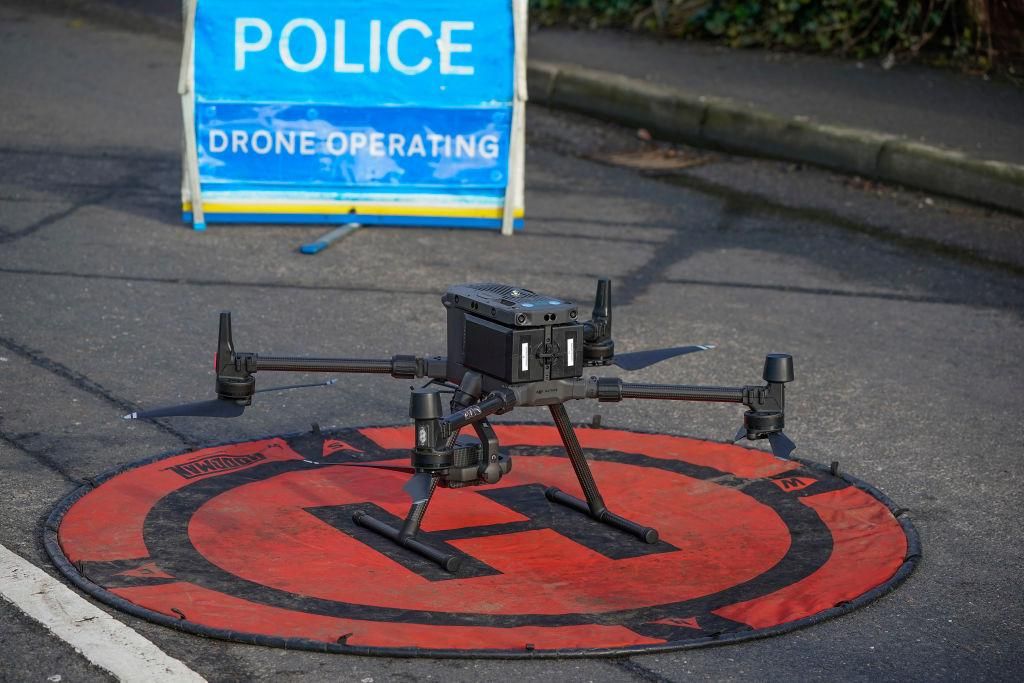 Cheshire police use their drone to survey floodwater as it begins to recede from the village of Farndon, Cheshire, in the aftermath of Storm Christoph on January 22, 2021 in Farndon, England. (Photo by Christopher Furlong/Getty Images)