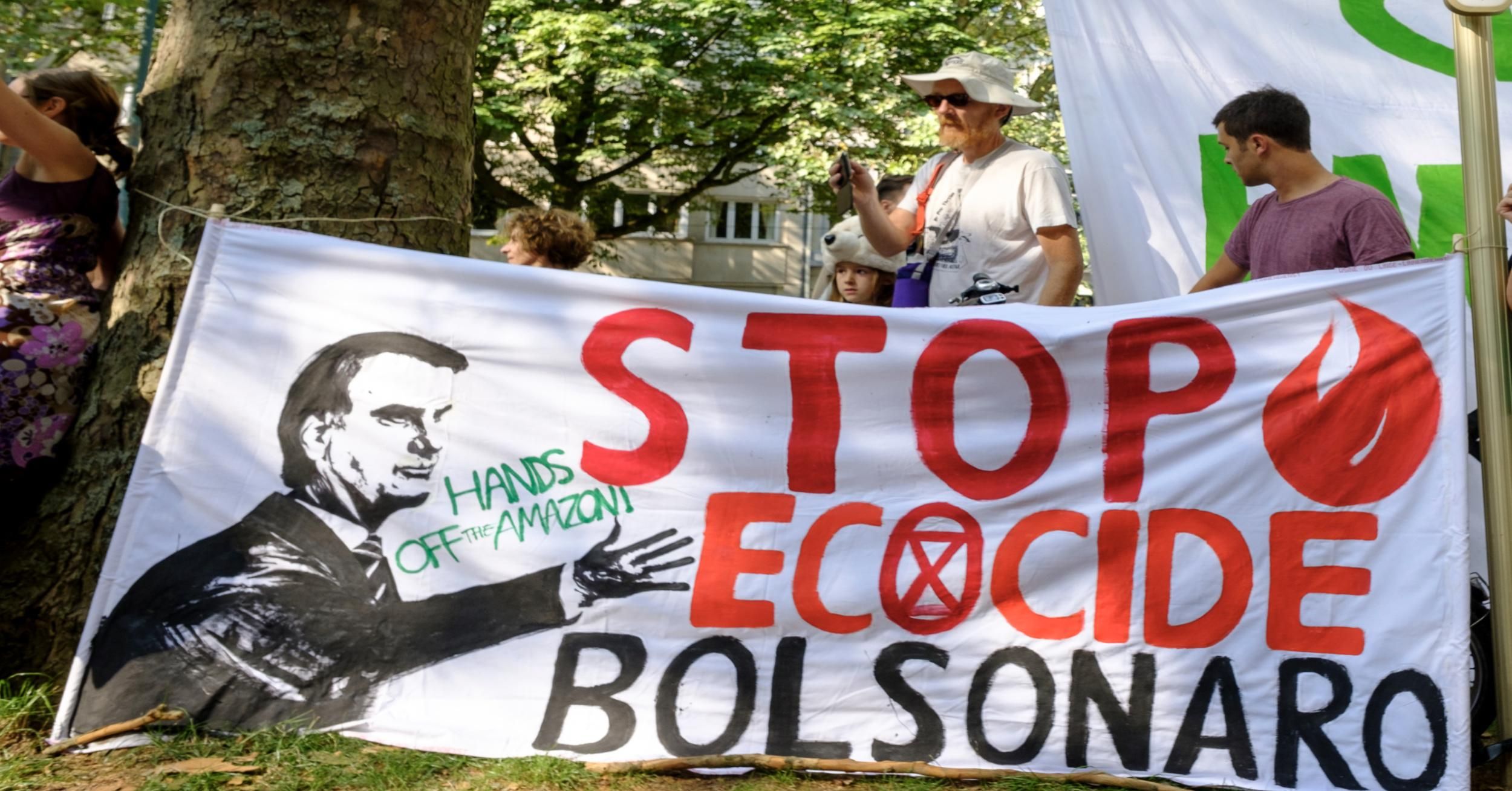 Activists gather in front of the Brazilian Embassy during a demonstration organised by Extinction Rebellion activists on August 26, 2019 in Brussels, Belgium. The protesters called on the Brazilian government to do more to tackle the the fires and deforestation in the Amazon rainforest. (Photo: Thierry Monasse/Getty Images)