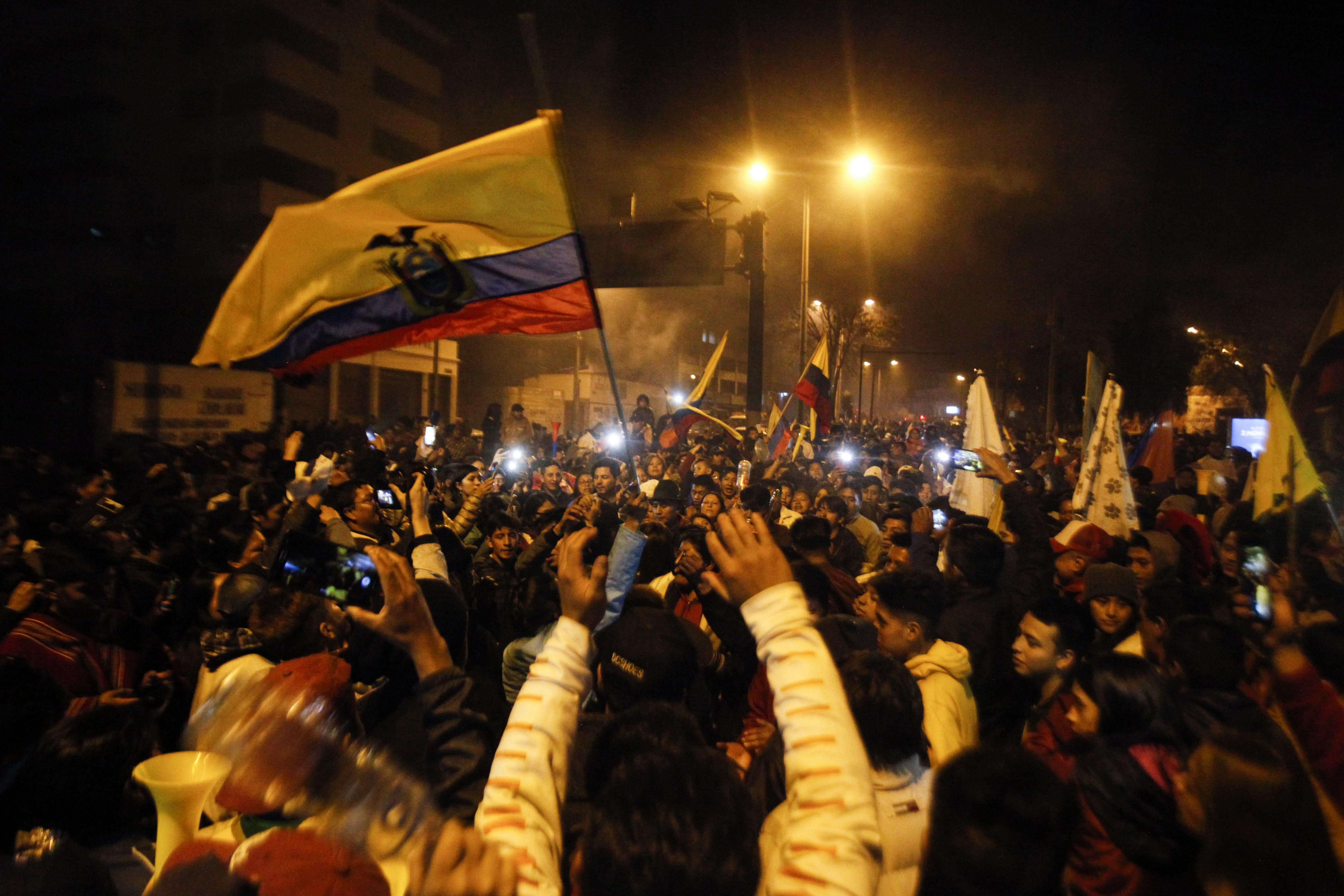 13 October 2019, Ecuador, Quito: Demonstrators cheer on the government's decision to withdraw the controversial increase in fuel prices. This was agreed by the government and the leadership of the indigenous peoples after lengthy negotiations. (Photo by Juan Diego Montenegro/picture alliance via Getty Images)