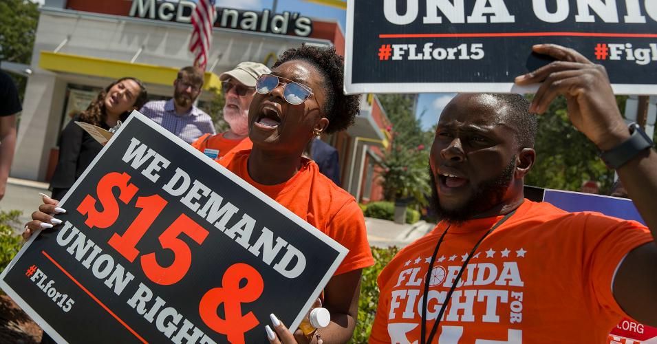 People gather together to ask the McDonald’s corporation to raise workers wages to a $15 minimum wage as well as demanding the right to a union on May 23, 2019 in Fort Lauderdale, Florida. The nation wide protest at McDonald’s was held on the day of the company’s shareholder meeting. (Photo by Joe Raedle/Getty Images)