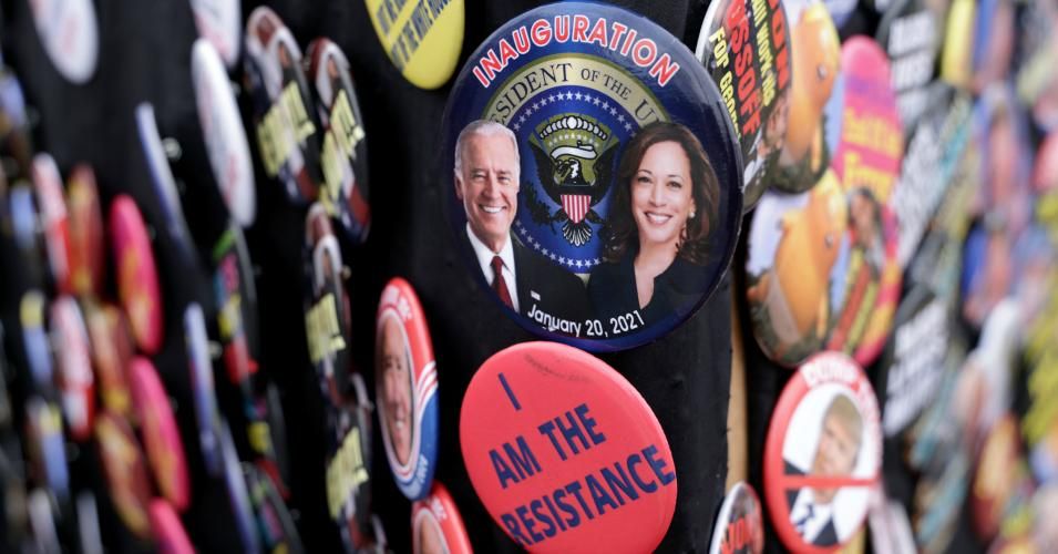 A button features President-elect Joe Biden and Vice President-elect Kamala Harris' inauguration is on display by a street vendor during a canvass launch event at New Life Outreach Christian Center January 2, 2021 in Eatonton, Georgia. (Photo: Alex Wong/Getty Images)