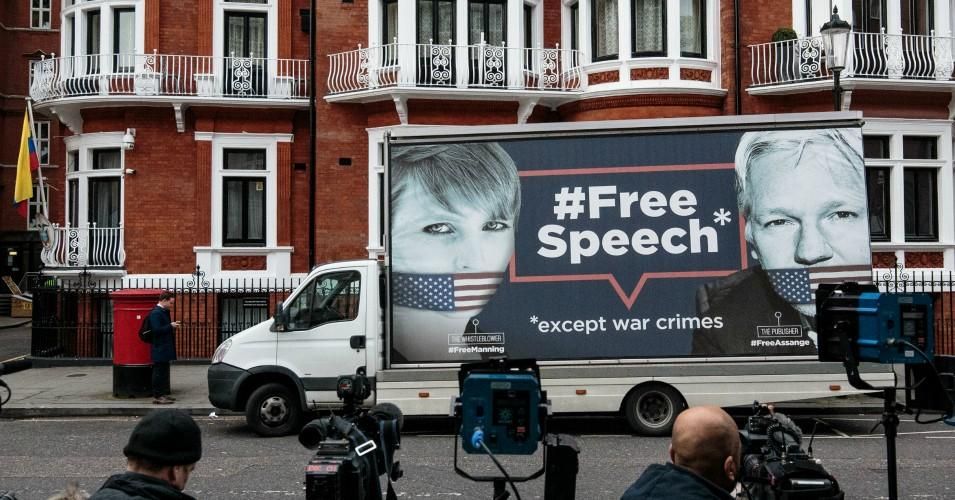 A van with a billboard in support of American whistleblower Chelsea Manning and WikiLeaks founder Julian Assange is parked outside the Ecuadorian Embassy in London