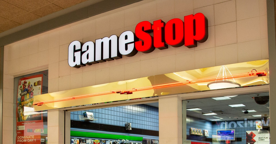 A woman walks past the GameStop store inside the Susquehanna Valley Mall. An online group sent share prices of GameStop (GME) and AMC Entertainment Holdings Inc. (AMC) soaring in an attempt to squeeze short sellers. (Photo: Paul Weaver/SOPA Images/LightRocket via Getty Images)