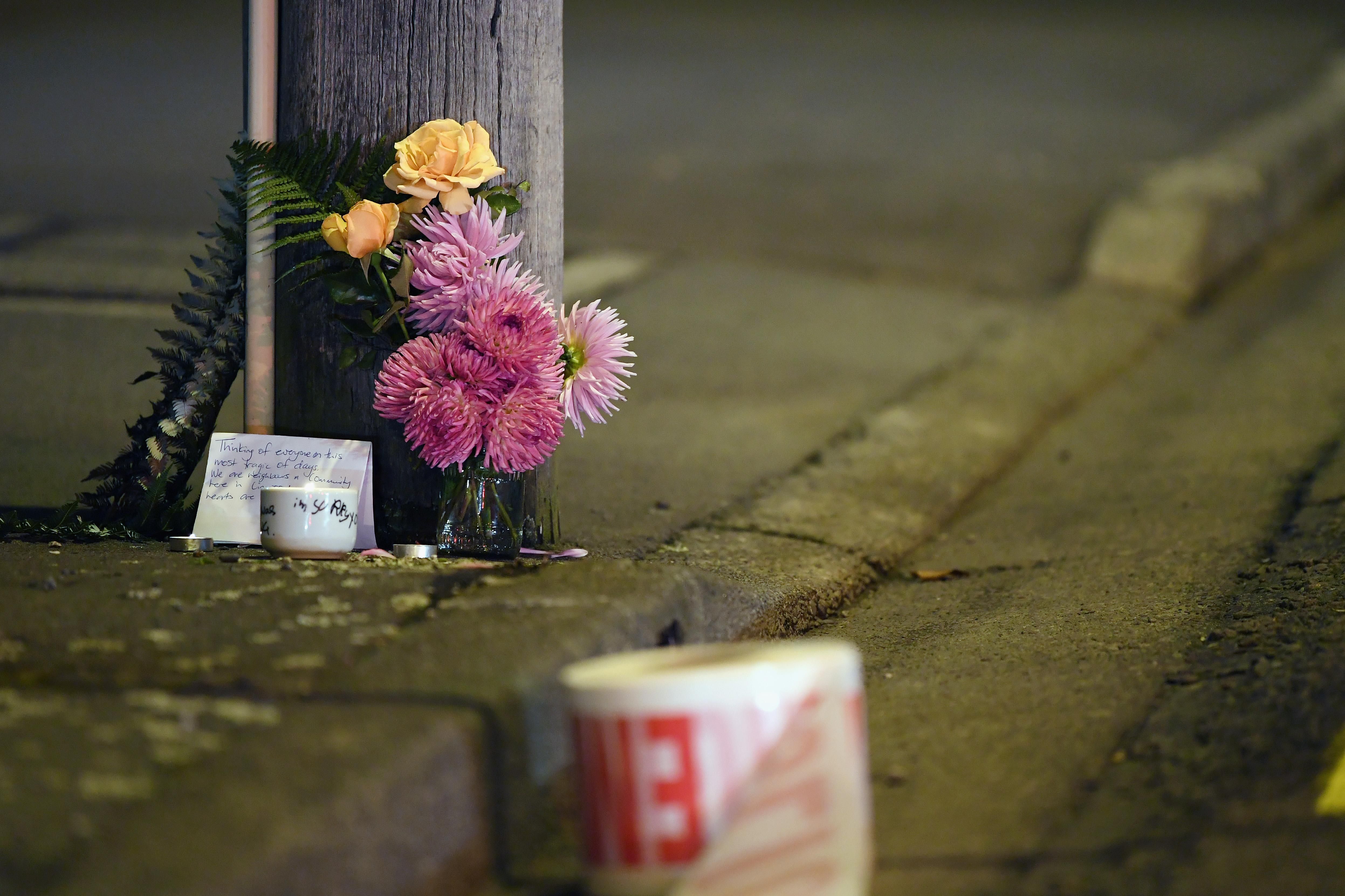 A floral tribute is seen on Linwood Avenue near the Linwood Masjid on March 15, 2019 in Christchurch, New Zealand. 49 people have been confirmed dead and more than 20 are injured following attacks at two mosques in Christchurch. Four people are in custody following shootings at Al Noor mosque on Dean's Road and the Linwood Masjid in Christchurch. Mosques across New Zealand have been closed and police are urging people not to attend Friday prayers as a safety precaution. (Photo by Kai Schwoerer/Getty Images)