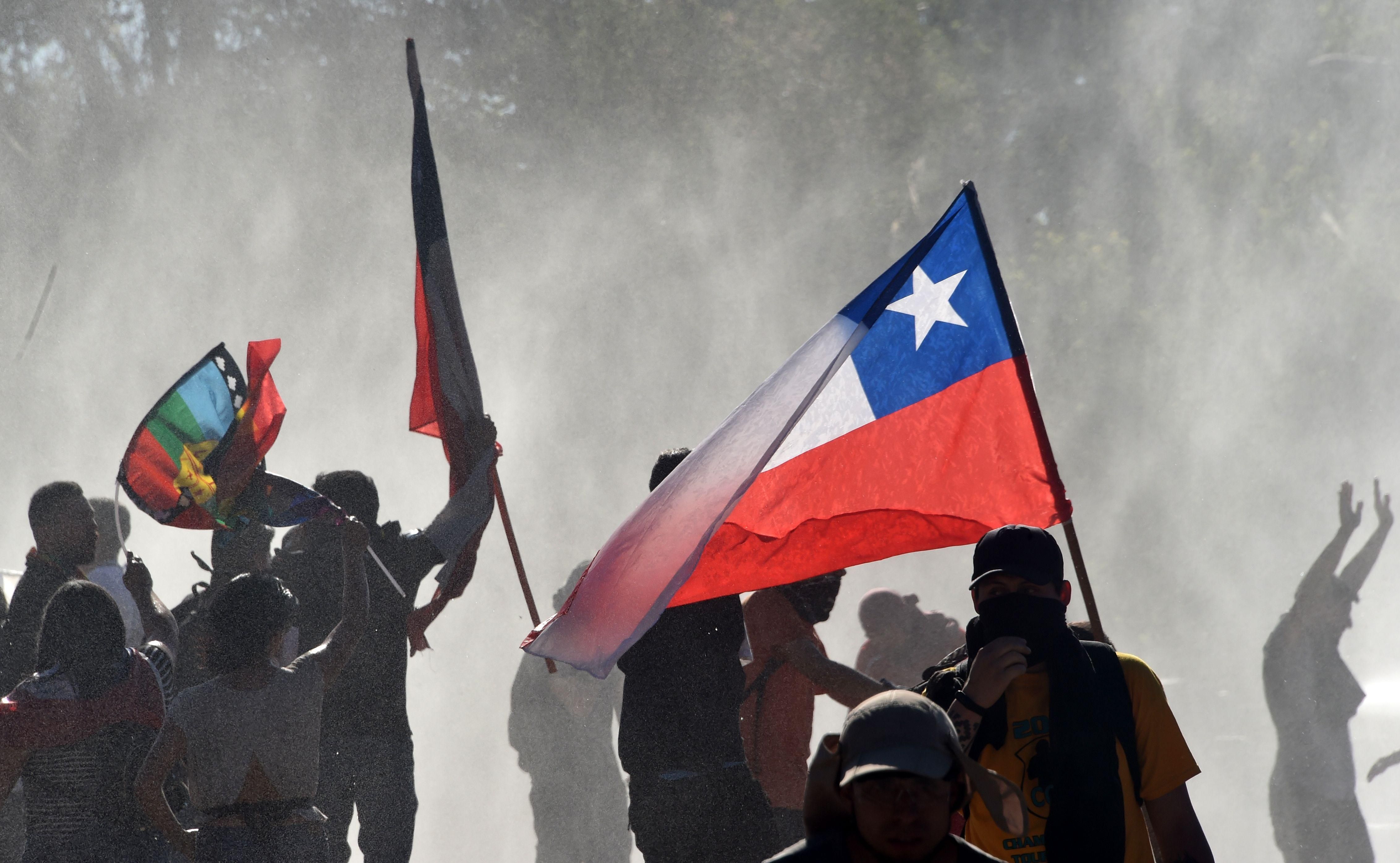 If Chenoweth is right and the million Chileans in the street have breached the tipping point for successful non-violent popular democracy, Chile may be leading the way to a global political and economic revolution. (Photo: RODRIGO ARANGUA/AFP via Getty Images)