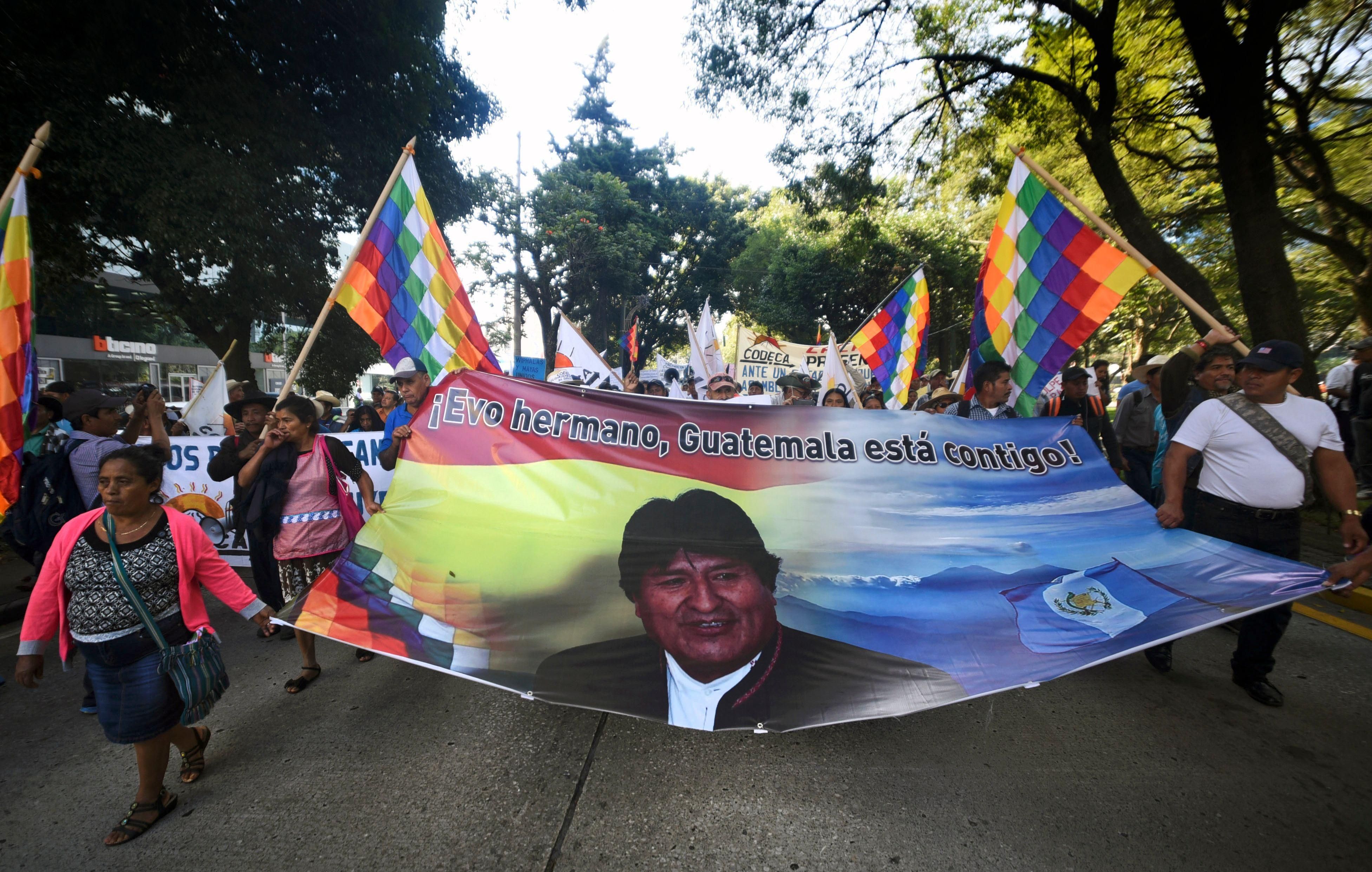 Guatemalan civilian and peasants organizations demonstrate in front of US Embassy in support of former Bolivian President Evo Morales, in Guatemala City, on November 14, 2019. (Photo: ORLANDO ESTRADA/AFP via Getty Images)