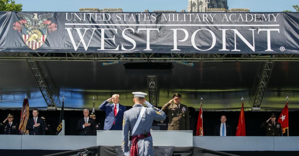 President Donald Trump and United States Military Academy superintendent Darryl A. Williams salute alongside graduating cadets as the national anthem is played during commencement ceremonies at Plain Parade Field at the United States Military Academy on June 13, 2020 in West Point, New York. Trump addressed the graduating class of 1,107 cadets during a socially-distanced ceremony held amid the Covid-19 pandemic. (Photo: John Minchillo-Pool/Getty Images)