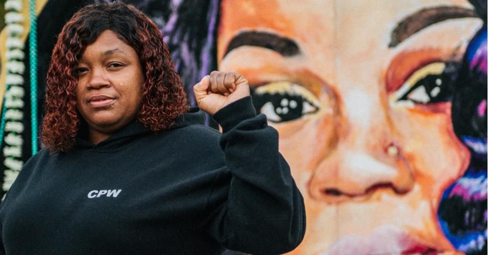 Tamika Palmer, mother of Breonna Taylor, in front of a mural of her daughter at Jefferson Square park on September 21, 2020 in Louisville, Kentucky.