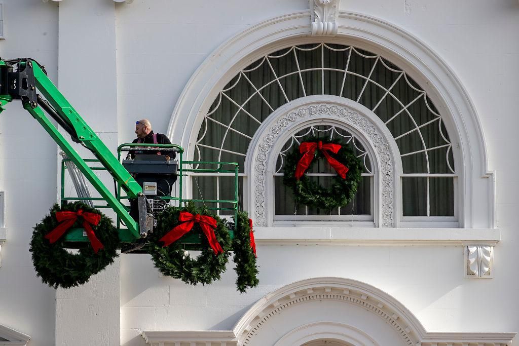 Christmas wreaths are installed at the White House on November 25, 2020 in Washington, DC. The White House is still planning Holiday parties despite federal and state warning about Covid-19 in the middle of a pandemic. (Photo by Tasos Katopodis/Getty Images)