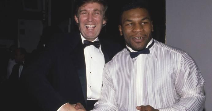 Donald Trump and Mike Tyson attend a March of Dimes dinner in New York City in November 1989.
