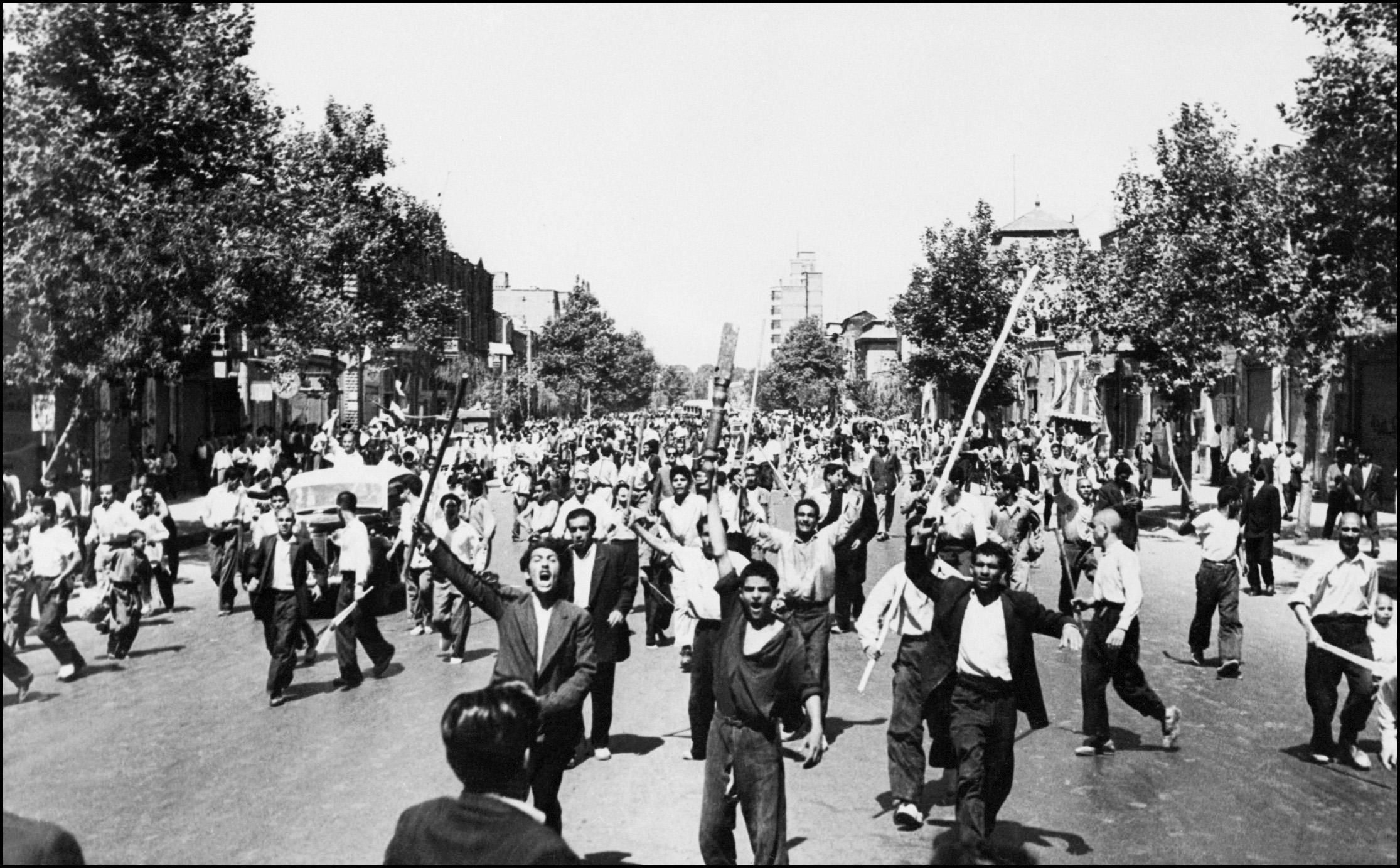 On August 19, 1953, democratically-elected Iranian Prime Minister Mohammad Mossadegh was overthrown in a coup orchestrated by the CIA and British intelligence, after having nationalized the oil industry. The Shah Mohammad Reza Pahlavi was re-installed in the primary position of power. Massive protests broke out across the nation, leaving almost 300 dead in firefights in the streets of Tehran. (Photo by - / INTERCONTINENTALE / AFP) (Photo: /AFP/Getty Images)