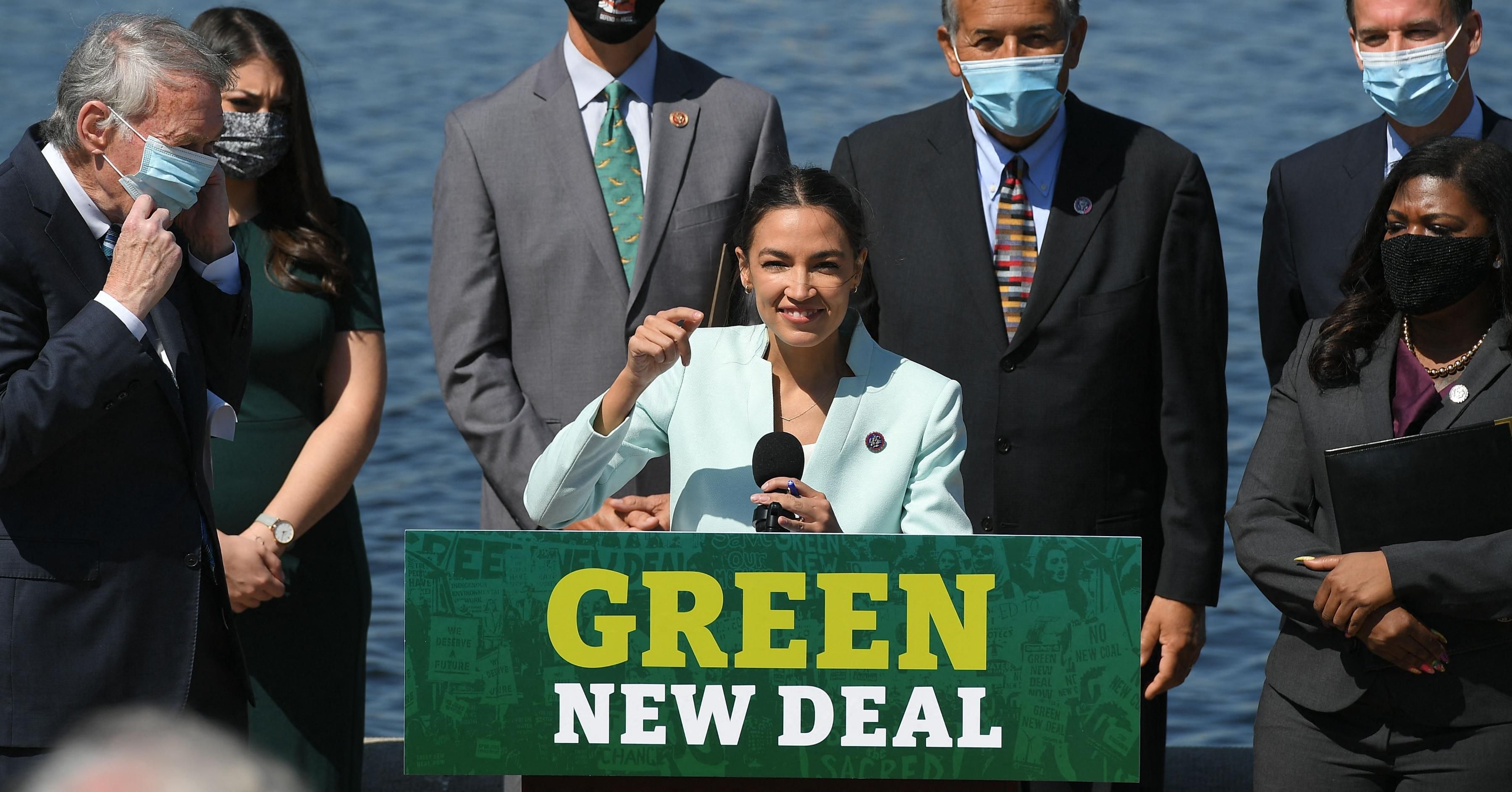 Representative Alexandria Ocasio-Cortez(D-NY) next to Senator Ed Markey, D-MA, speaks during a press conference to re-introduce the Green New Deal in front of the US Capitol in Washington, DC on April 20, 2021. (Photo: MANDEL NGAN/AFP via Getty Images)