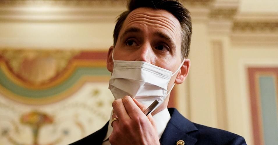 U.S. Senator Josh Hawley (R-Mo.) talks to reporters during a break in opening arguments in the impeachment trial of former President Donald Trump, on charges of inciting the deadly attack on the US Capitol, on Capitol Hill in Washington, DC, February 10, 2021. (Photo: Joshua Roberts/Pool/AFP via Getty Images)
