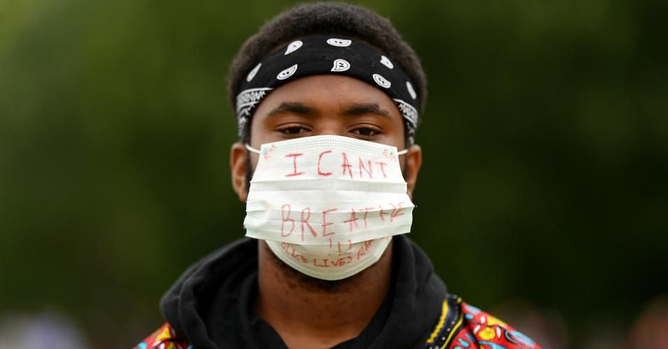 A protester wears a face mask displaying the words "I can't breathe" during a Black Lives Matter protest in Hyde Park on June 3, 2020 in London, United Kingdom. The death of an African-American man, George Floyd, while in the custody of Minneapolis police has sparked protests across the United States, as well as demonstrations of solidarity in many countries around the world. (Photo: Justin Setterfield/Getty Images)