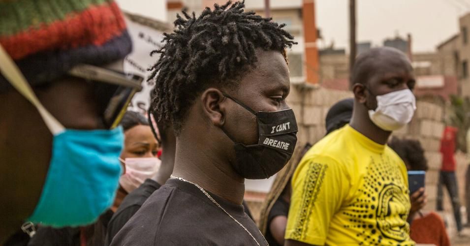 Photo taken on June 6, 2020 shows a man wearing a mask with words "I Can't Breathe" during a protest over the death of George Floyd held in Dakar, Senegal. (Photo by Eddy Peters/Xinhua/ via Getty Images)