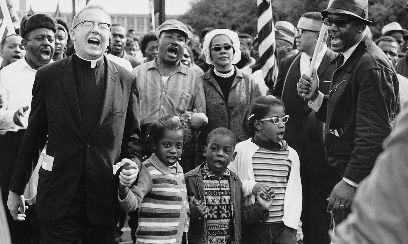 Dr Martin Luther King, Dr Ralph David Abernathy, their families, and others leading the Selma to Montgomery march in 1965. 
