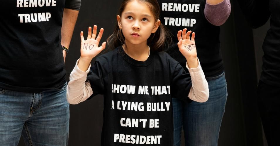 A child participant seen during the rally. Dozens of protesters take part in a rally called "Swarm the Senate" in the Hart Senate Office Building urging action to "impeach, remove, indict and jail" President Trump. (Photo: Michael Brochstein / Echoes Wire / Barcroft Media via Getty Images)
