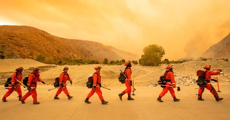 Incarcerated firefighters arrive at the scene of the Water fire, a new start about 20 miles from the Apple fire in Whitewater, California, on August 2, 2020. (Photo: Josh Edelson/AFP/Getty Images)