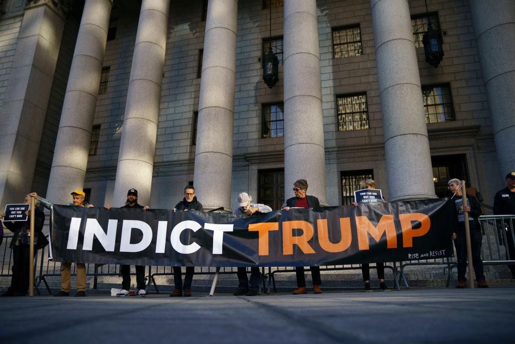 Activists protest outside federal court during a hearing related to President Donald Trump's financial records on October 23, 2019 in New York City. (Photo by Drew Angerer/Getty Images)