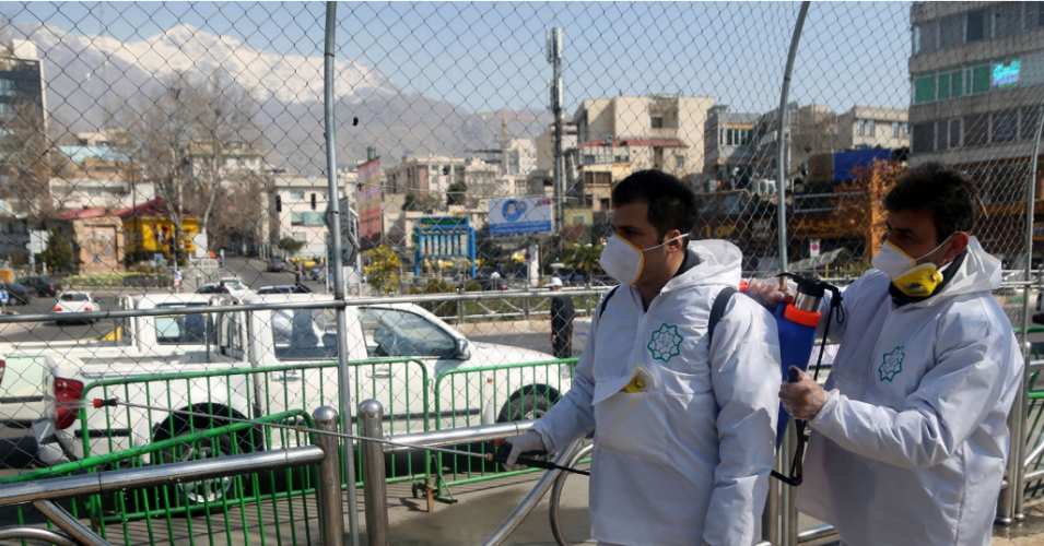 Fire fighters and municipality workers with protective suits disinfect the streets, buses and taxies as a precaution to the coronavirus (Covid-19) in Tehran, Iran on March 06, 2020. (Photo: Fatemeh Bahrami/Anadolu Agency via Getty Images)