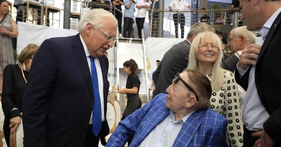 US Ambassador to David Friedman speaks with US businessman and philanthropist Sheldon Adelson during the opening of an ancient road at the City of David archaeological and tourist site in the Palestinian neighborhood of Silwan in east Jerusalem on June 30, 2019. 