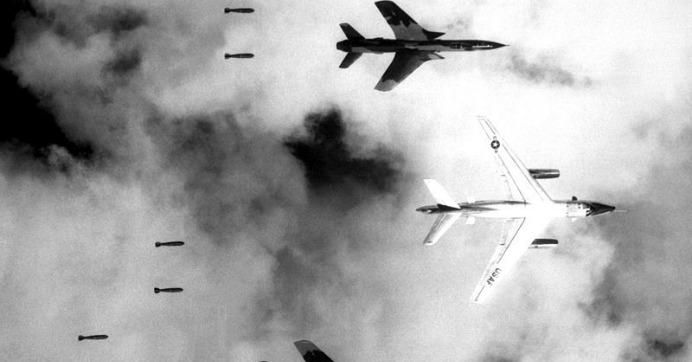 A U.S. B-66 Destroyer and F-105 Thunderchief dropping bombs on North Vietnam during Operation Rolling Thunder on June 14, 1966. (Photo via Wikimedia Commons)