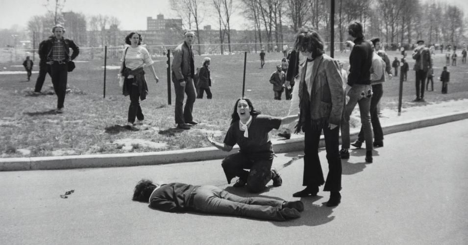 Mary Ann Vecchio kneels over the body of the student Jeffrey Miller, who was killed by Ohio National Guard troops during an antiwar demonstration at Kent State University on May 4, 1970. (Photo: John Paul Filo/Library of Congress Prints and Photographs Division Washington, D.C.)