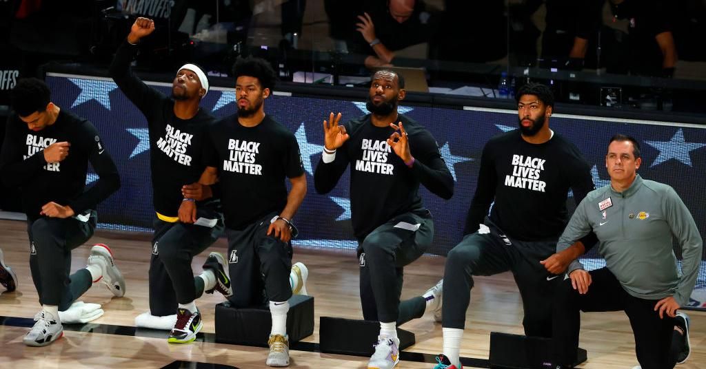 Members of the Los Angeles Lakers kneel during the national anthem before the start of Game Five of the Western Conference First Round against the Portland Trail Blazers during the 2020 NBA Playoffs on August 29, 2020. (Photo: Kevin C. Cox/Getty Images)