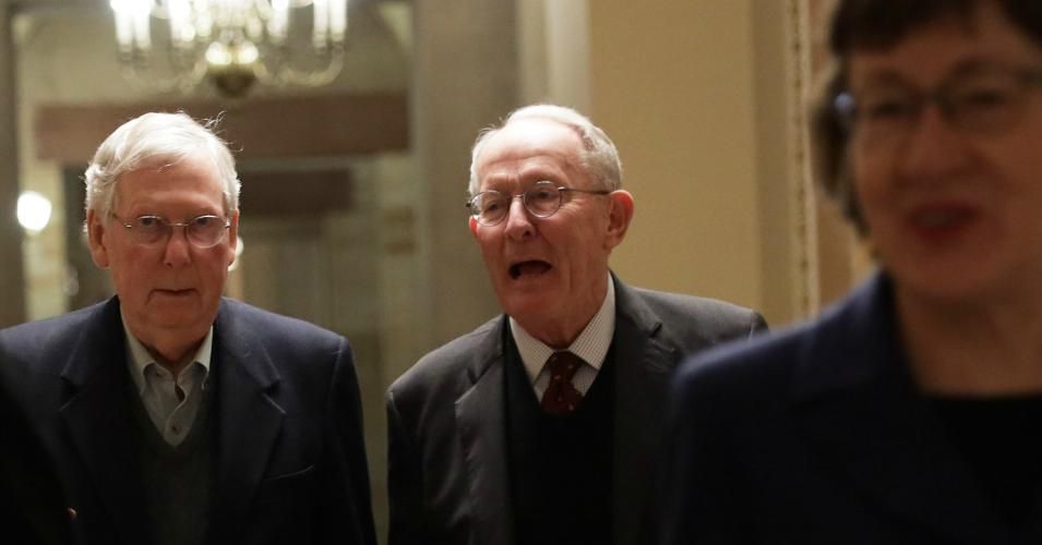U.S. Senate Majority Leader Sen. Mitch McConnell (R-KY) walks with Sen. Lamar Alexander (R-TN) and Sen. Susan Collins (R-ME) in a hallway after a vote December 2, 2019 at the U.S. Capitol in Washington, DC. (Photo: Alex Wong/Getty Images)