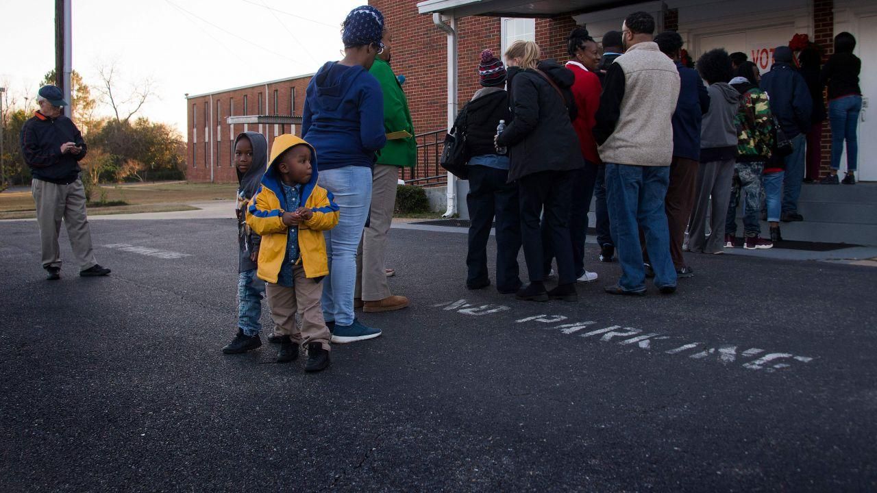 Voters stand in a long line that stretches out the door to vote at Beulah Baptist Church polling station in Montgomery, Alabama, on Dec. 12, 2017. (Photo by Jim Watson/AFP/Getty Images)