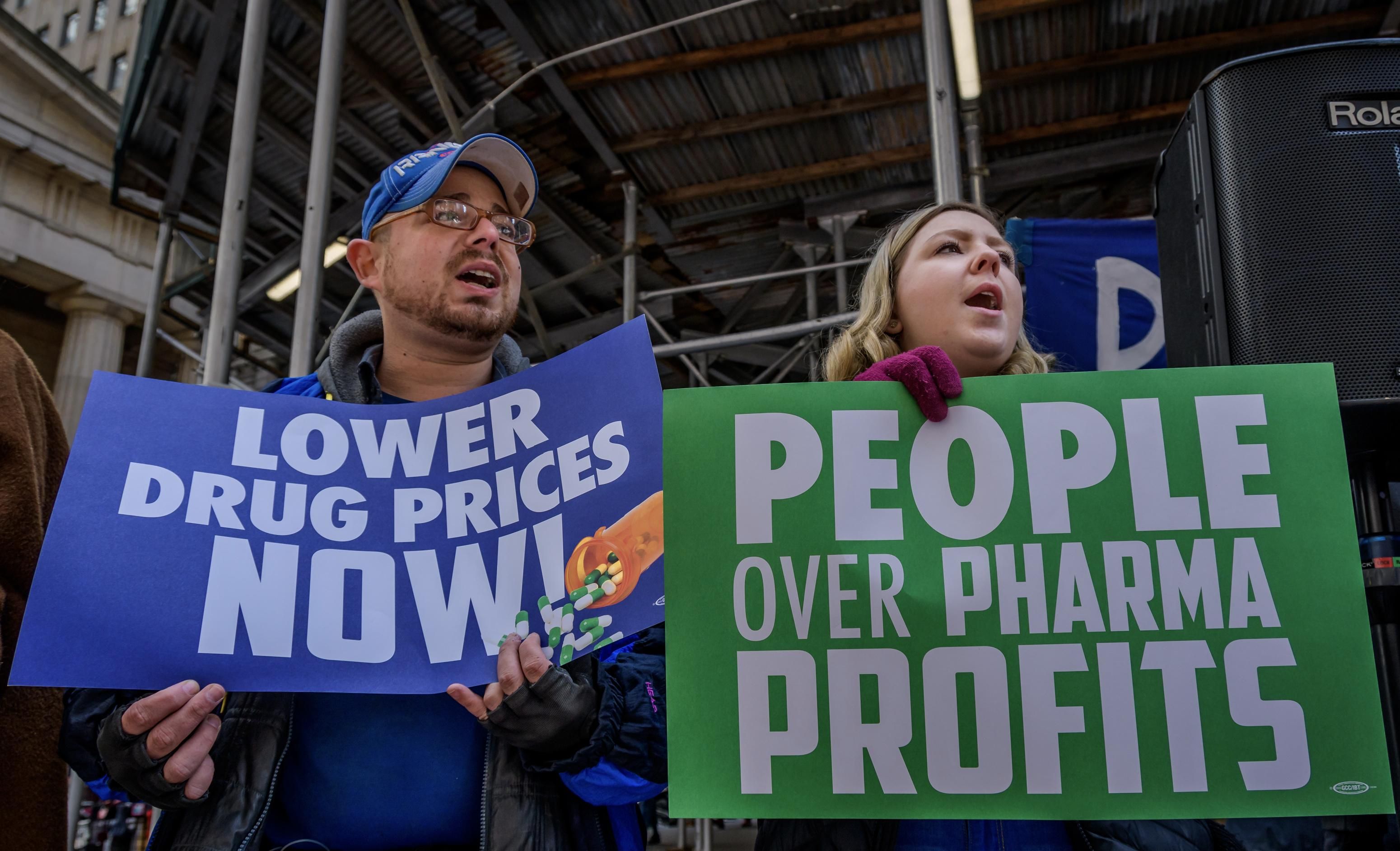 Participants holding protest signs at the rally. People living with diabetes, activists, faith leaders, and health care advocates rallied in front of the New York Stock Exchange to commemorate World Diabetes Day 2019, as part of a National Day of Action called by the Lower Drug Prices Now Campaign. (Photo by Erik McGregor/LightRocket via Getty Images)