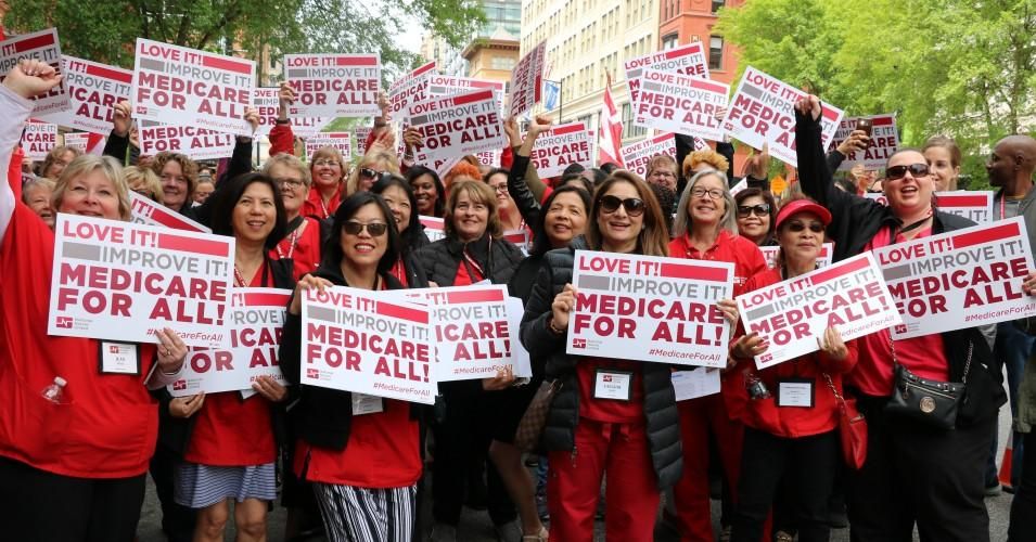 National Nurses United (NNU), along with a broader coalition of pro-Medicare for All organizations, rallied outside of the national headquarters of PhRMA in support of Medicare for All.